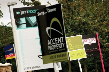 Estate agent 'For sale' and 'To let' signs
