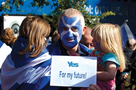 Man with Scottish flag painted on face