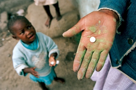 African child with pill