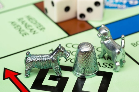 Monopoly pieces, board and dice
