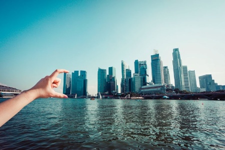 Hand on Singapore skyline