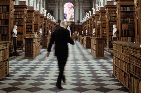 Man walking in university library